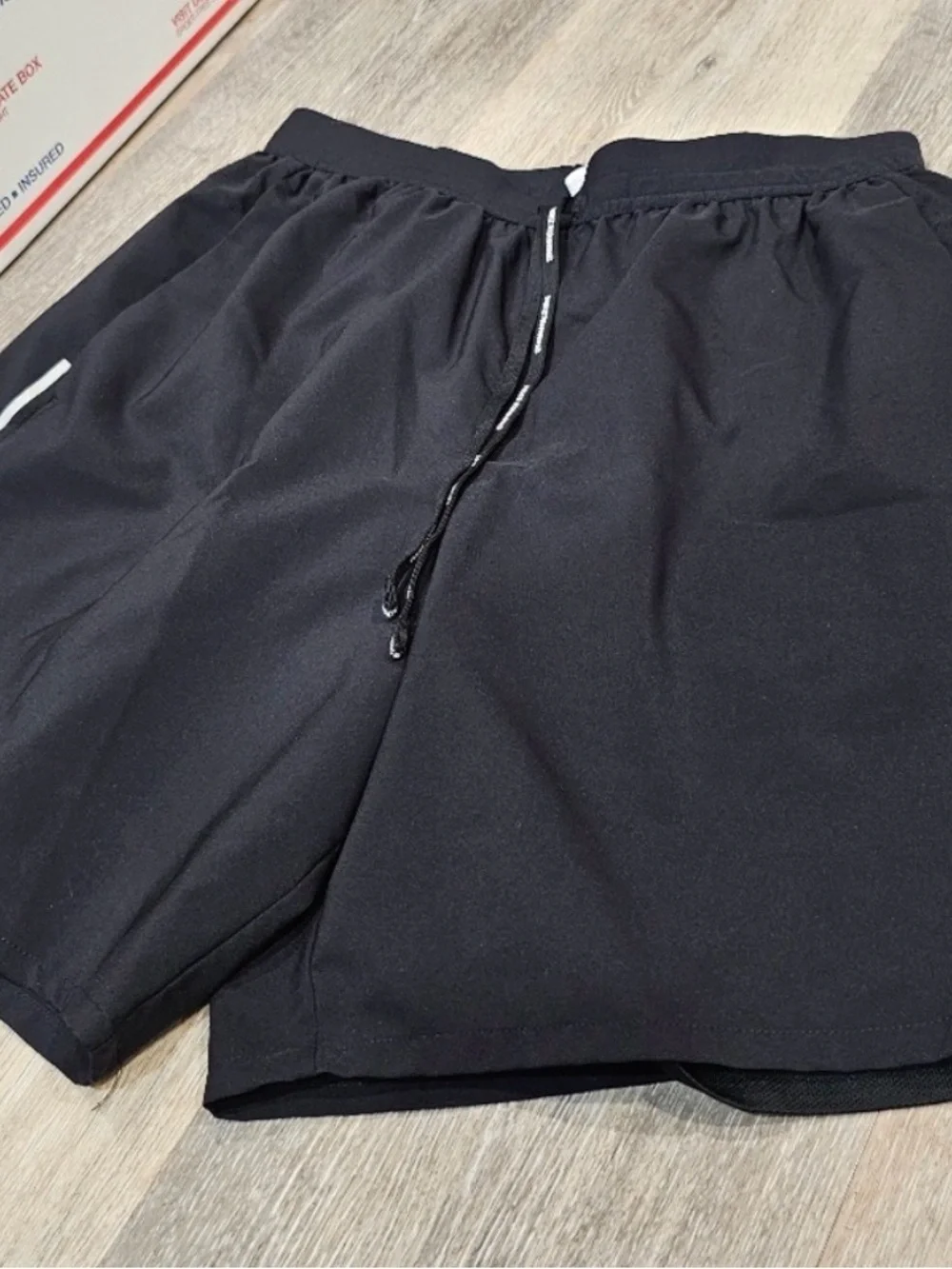 2 pair of Nike Running Shorts blue and black zipper pockets 7 inch lined